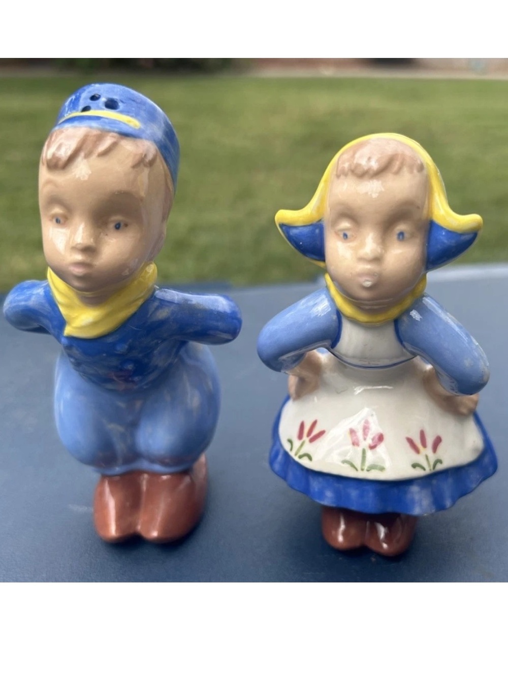 VINTAGE DUTCH BOY AND GIRL SALT AND PEPPER SHAKERS